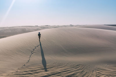 Scenic view of desert against sky