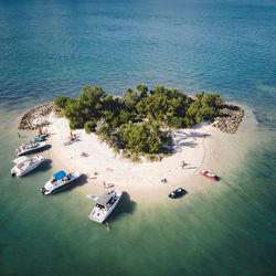 High angle view of boats on sea shore