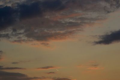 Low angle view of dramatic sky during sunset