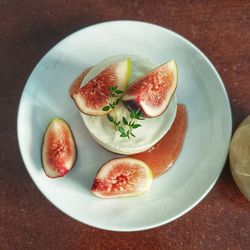 High angle view of fruits in plate on table