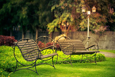 Empty park benches in park