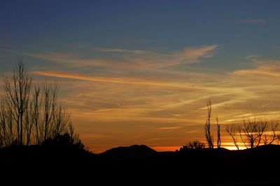 Scenic view of dramatic sky during sunset