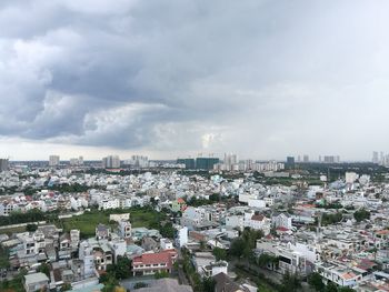 Aerial view of cityscape against sky