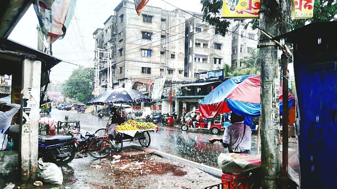 PANORAMIC VIEW OF FLAG ON CITY STREET