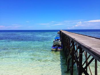 Scenic view of sea against blue sky