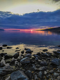 Scenic view of sea against sky during sunset