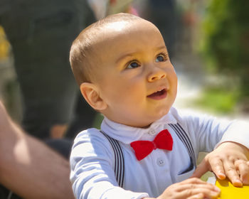 Portrait of cute boy looking away