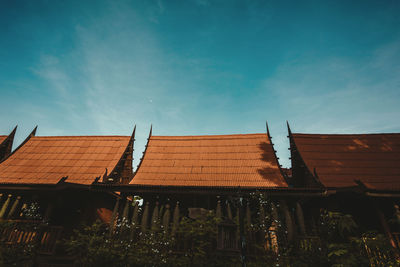 Low angle view of roof of building against sky