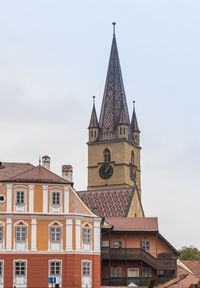 Clock tower against sky