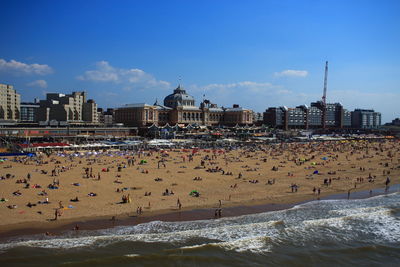 Panoramic view of sea and buildings against sky