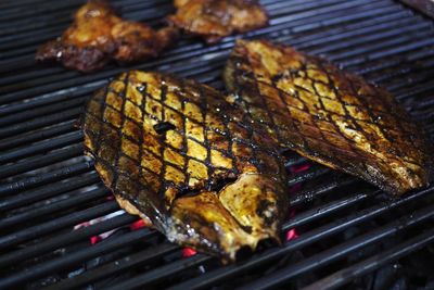 Close-up of meat on barbecue grill