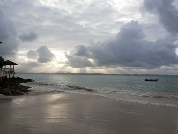 Scenic view of seascape against cloudy sky