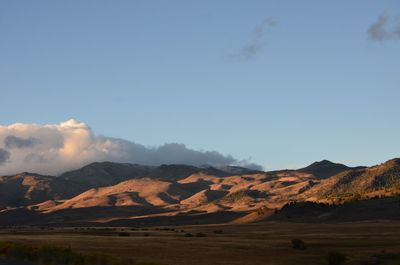 Scenic view of mountains against sky