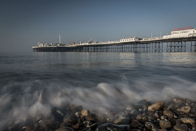 View of bridge over sea against sky