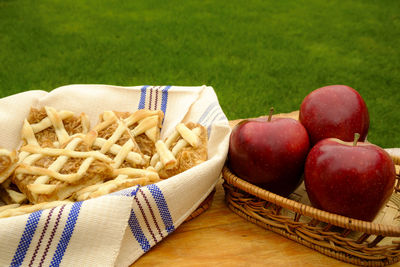 Close-up of fruits in basket on table