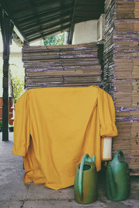 Clothes hanging on wall of building