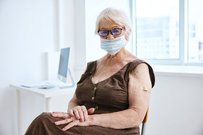 Portrait of woman wearing mask