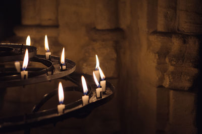 Close-up of lit tea light candles