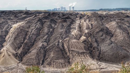 Panoramic view of rock formations against sky