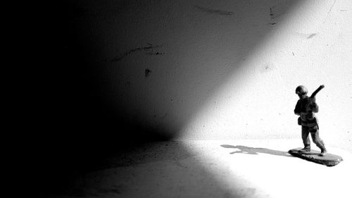Shadow of woman on wall