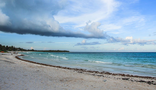 Scenic view of beach against sky