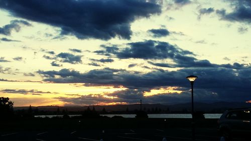 Clouds over road at dusk