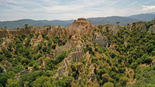 Panoramic view of mountain range against sky