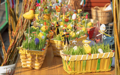 Close-up of plants in basket on table at market stall