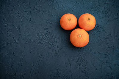Close-up of oranges on wall