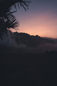 Scenic view of silhouette trees against sky during sunset