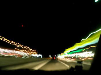 Light trails on road at night