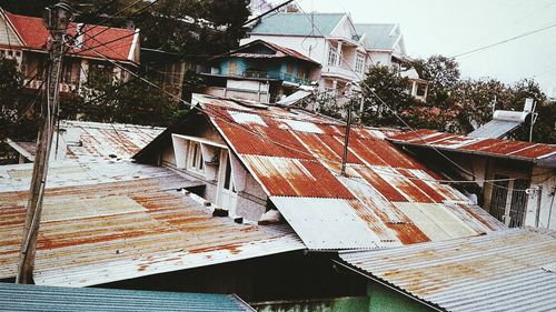 Low angle view of residential district against sky