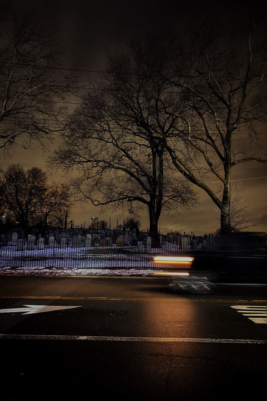 VIEW OF CITY STREET AT DUSK