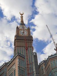 The royal clock tower makkah  surrounded by clouds