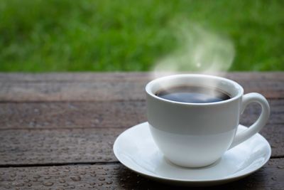 Close-up of coffee cup on table