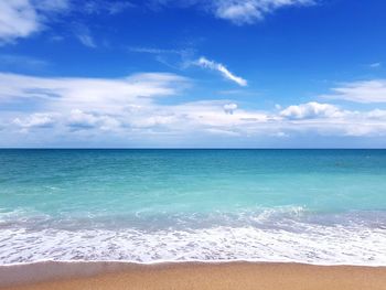 Scenic view of sea against blue sky