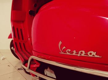 Close-up of red vintage car