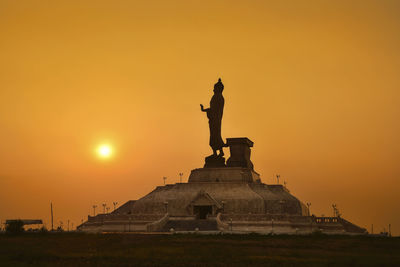 Statue of liberty against sky during sunset