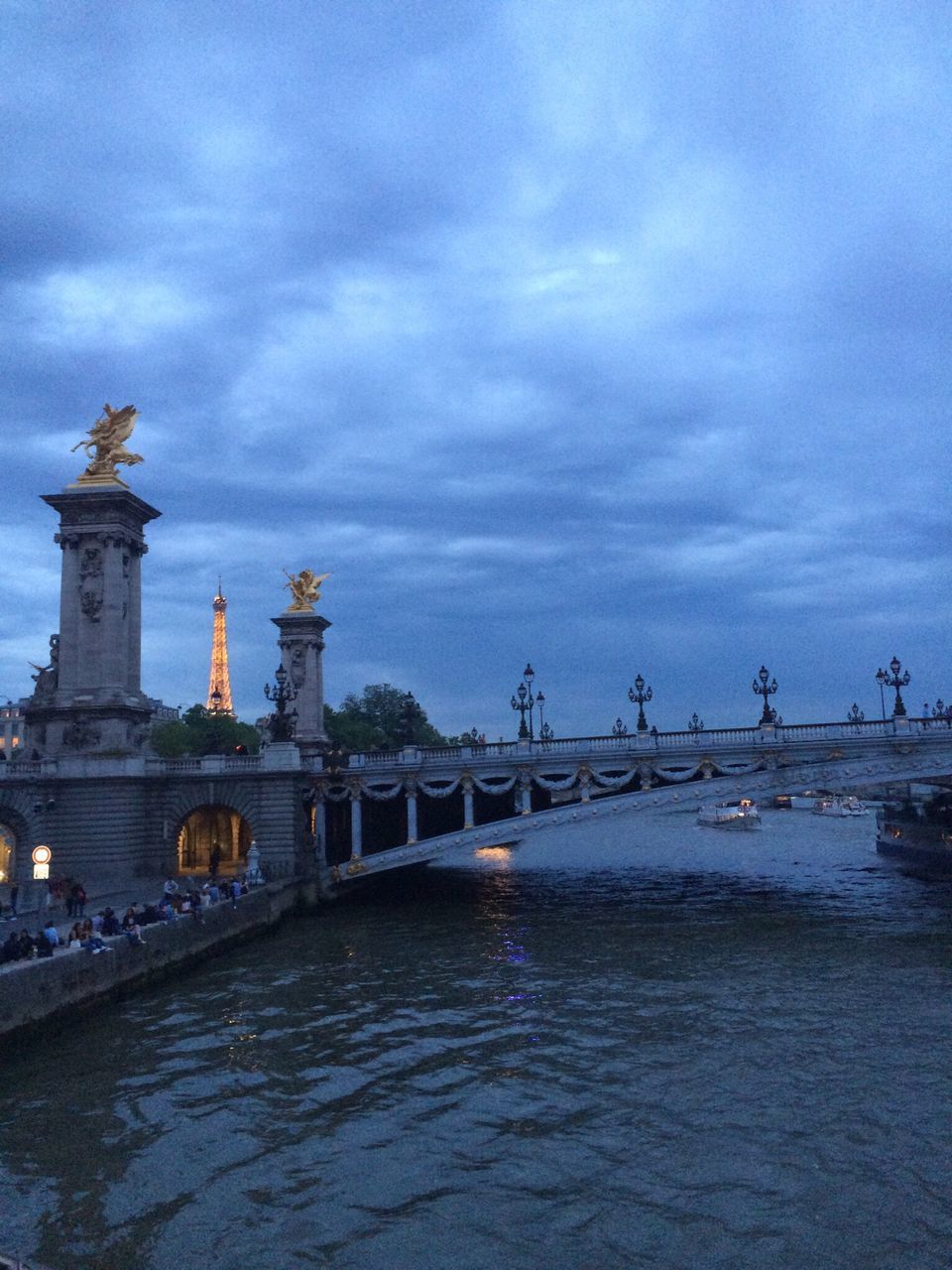 architecture, built structure, water, waterfront, sky, connection, bridge - man made structure, cloud - sky, building exterior, river, cloudy, transportation, bridge, travel destinations, cloud, famous place, rippled, engineering, international landmark, travel