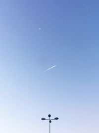 Airplane on the clear blue sky