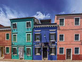 Low angle view of residential building against sky