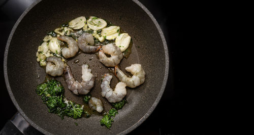 Directly above shot of mushrooms in cooking pan