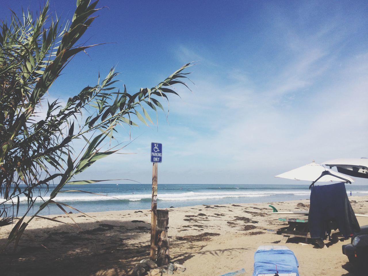 sea, beach, horizon over water, sky, water, sand, shore, tranquility, blue, tranquil scene, scenics, nature, beauty in nature, cloud, idyllic, sunlight, day, outdoors, incidental people, cloud - sky