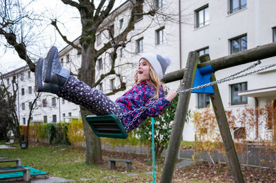 View of a girl playing on playground