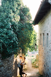 Rear view of woman walking on street