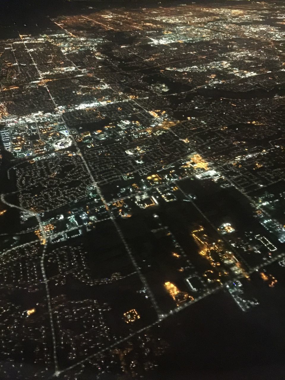 AERIAL VIEW OF CITY AT NIGHT