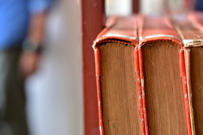 Close-up of books on wood