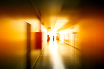 Illuminated corridor of building