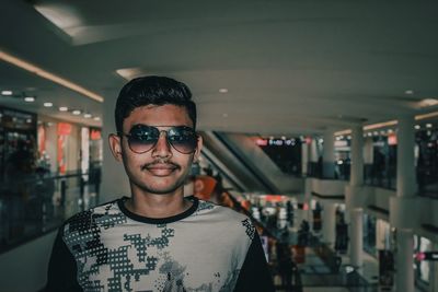 Portrait of young man wearing sunglasses