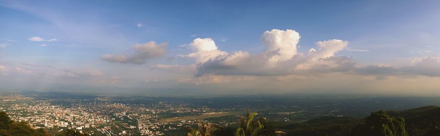 Aerial view of cityscape against sky
